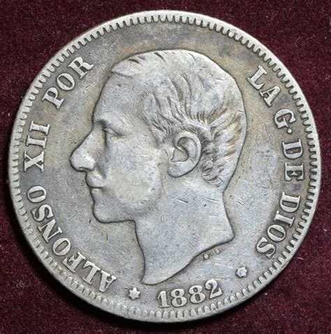 2 pesetas 1882|moneda 2 pesetas 1984.